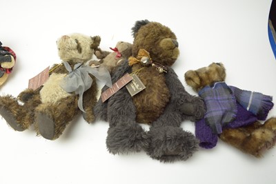 Lot 455 - A collection of teddy bears