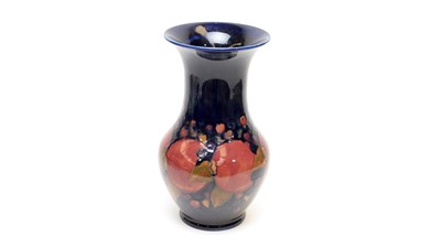 Lot 878 - A Moorcroft pomegranate pattern vase