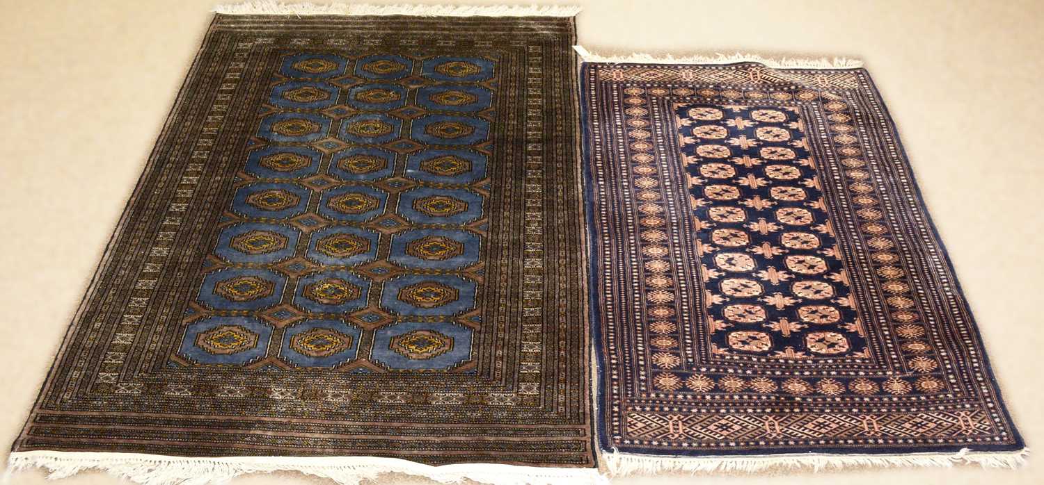 Lot 72 - A 20th Century Turkmen rug with another