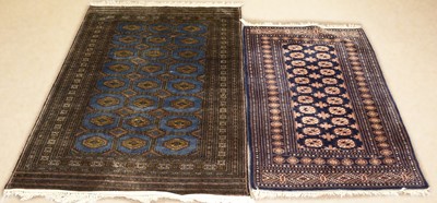 Lot 72 - A 20th Century Turkmen rug with another