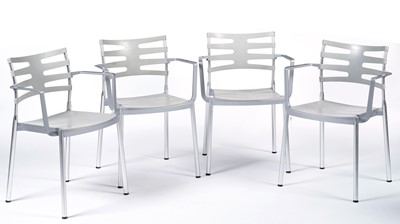 Lot 27 - A contemporary chrome and glass tilt action table / Fritz Hansen - Ice dining chair by Kaspar Salto