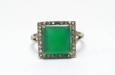 Lot 96 - A green glass and diamond cluster dress ring
