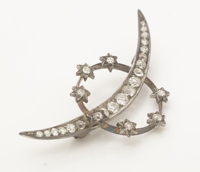 Lot 673 - A Victorian diamond crescent brooch