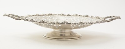 Lot 24 - A pair of George V silver two-handled fruit or dessert stands