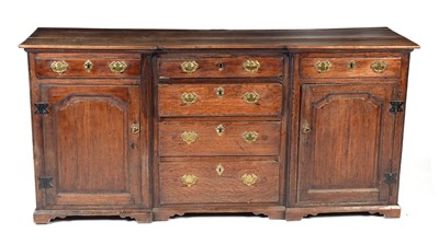 Lot 1437 - An 18th Century oak breakfront dresser base