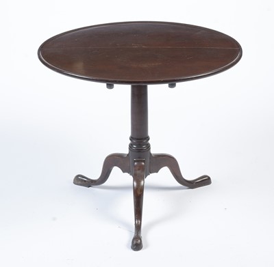 Lot 1441 - A George III mahogany tripod tilt action table