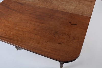 Lot 939 - A George IV mahogany drop leaf dining table