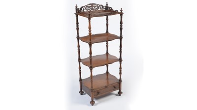 Lot 1451 - A Victorian rosewood four-tier serpentine whatnot