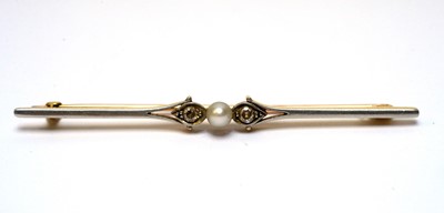 Lot 107 - A diamond and pearl bar brooch