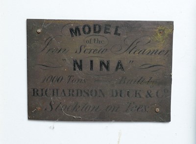 Lot 428 - Stained wood half block model boats, mounted to a board