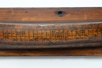 Lot 428 - Stained wood half block model boats, mounted to a board