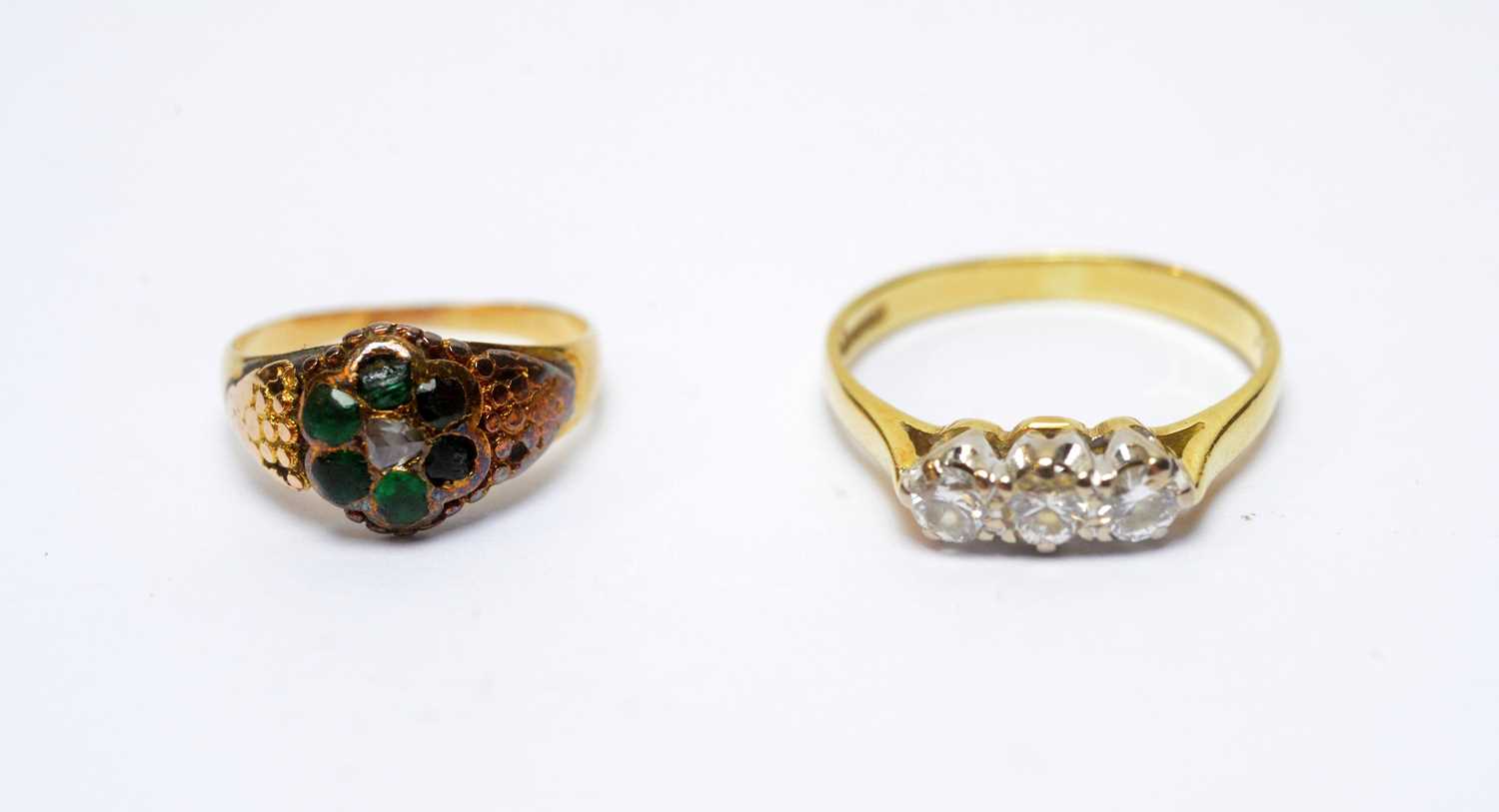 Lot 97 - A 19th Century child's ring; and a diamond three stone ring
