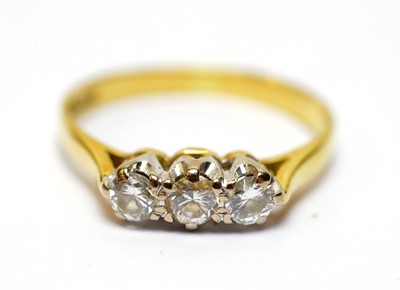Lot 97 - A 19th Century child's ring; and a diamond three stone ring