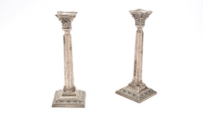 Lot 25 - A pair of George VI silver candlesticks