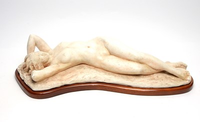 Lot 1290 - A 20th Century plaster figure of a reclining nude