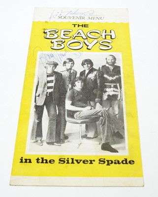 Lot 1025 - A souvenir menu signed by 3 members of The Beach Boys