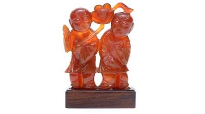 Lot 856 - Chinese brown agate group of the HeHe twins
