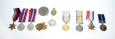 Lot 1007 - British medals and cap badges.