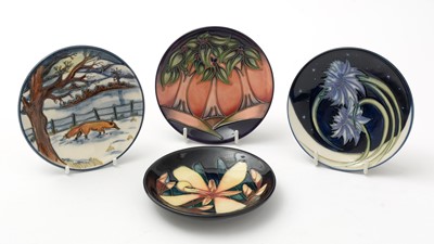 Lot 103 - Four small Moorcroft dishes boxed