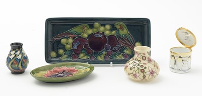 Lot 105 - Moorcroft pin tray, another. two small vases and an enamel box.