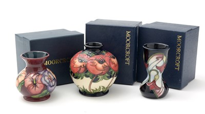 Lot 108 - Three Moorcroft vases, boxed.