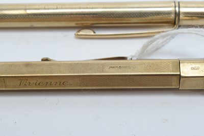 Lot 143 - Two 9ct yellow gold pencils