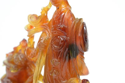 Lot 851 - A Chinese carved agate figure of Quanyin