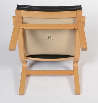 Lot 15 - Nielaus Mobler of Denmark: a pair of mid-Century teak and black leather button back lounge chairs