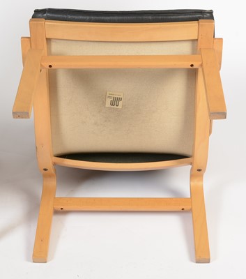 Lot 15 - Nielaus Mobler of Denmark: a pair of mid-Century teak and black leather button back lounge chairs
