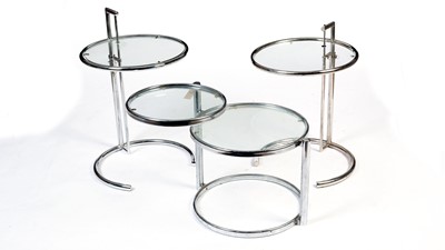 Lot 19 - After Eileen Gray: three circular chrome and glass occasional tables