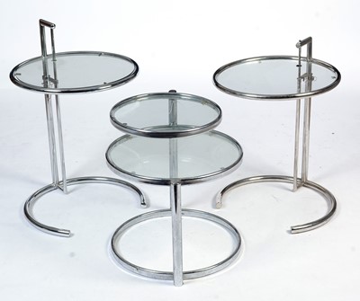 Lot 19 - After Eileen Gray: three circular chrome and glass occasional tables