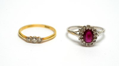 Lot 82 - A diamond rings and a ruby and diamond cluster ring