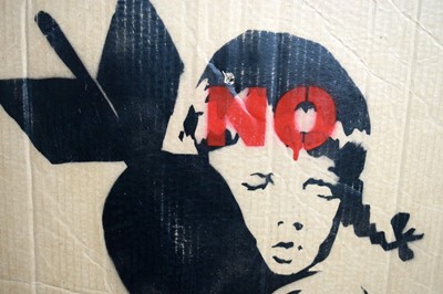 Lot 141 - BANKSY - "Bomb Hugger" Anti-Iraq War Protest March Plaqard | spray paint on cardboard