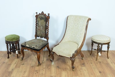 Lot 60 - Two Victorian carved nursing chairs and two stools.