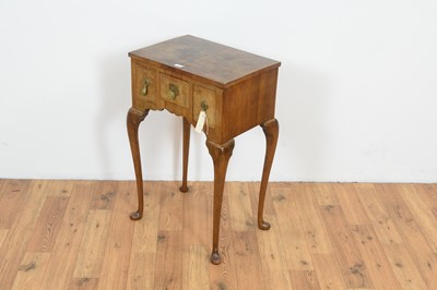 Lot 63 - A small and attractive crossbanded burr walnut lowboy/side table in the early 18th Century taste.