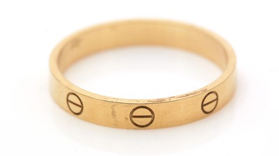 Lot 680 - An 18ct yellow gold Cartier Love ring