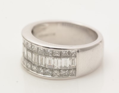 Lot 682 - A diamond half-hoop eternity ring