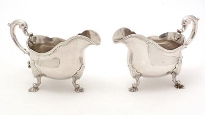 Lot 19 - A pair of George III silver sauce boats