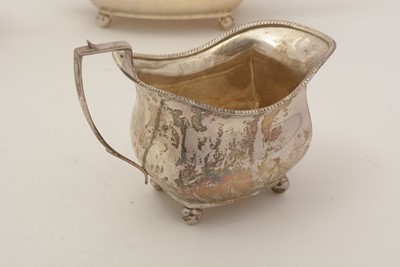 Lot 21 - A George V silver three-piece tea set
