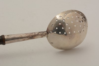 Lot 307 - A Charles II large silver strainer spoon