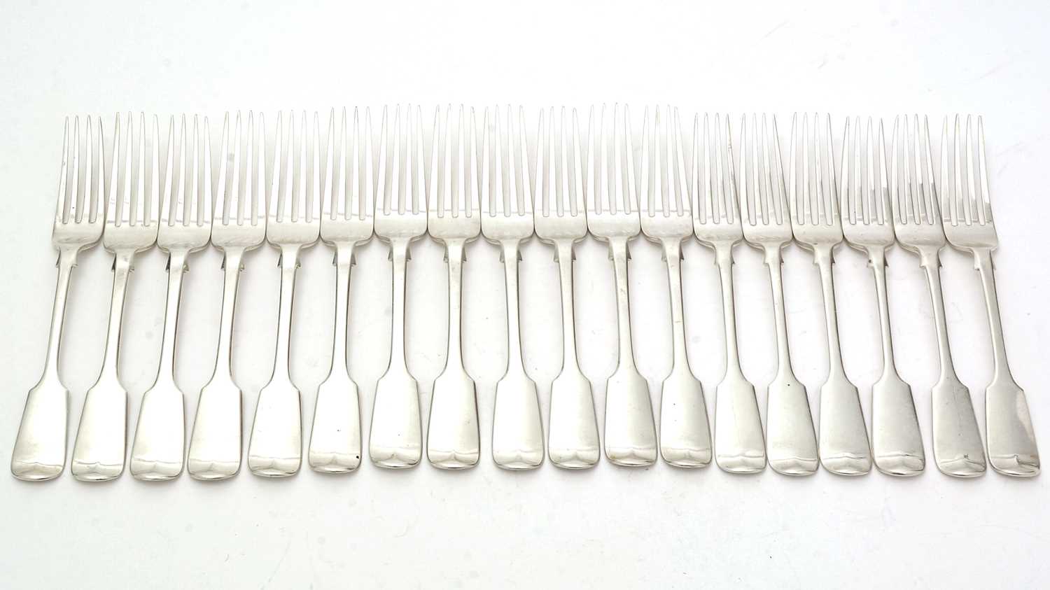 Lot 309 - A set of twelve Victorian silver fiddle pattern table forks; and a further set of six