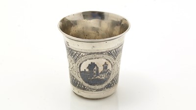 Lot 223 - A small late 19th Century Russian niello-work beaker or tot cup