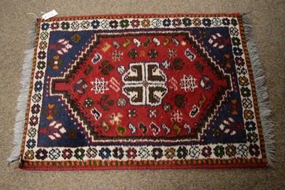 Lot 59 - A vintage 20th Century Afghan Aqsha rug with another