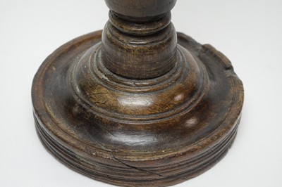 Lot 245 - A 17th Century stained oak pricket candlestick