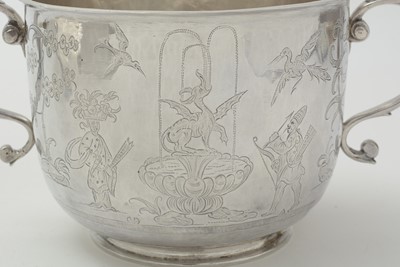 Lot 202 - A late Charles II silver chinoiserie porringer and cover