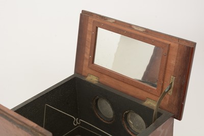 Lot 701 - An early 20th Century mahogany table top stereoscope slide viewer