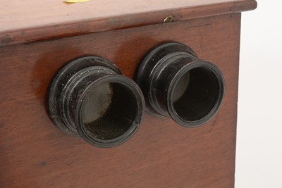 Lot 701 - An early 20th Century mahogany table top stereoscope slide viewer