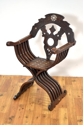 Lot 33 - An early 20th Century carved walnut Savonarola chair