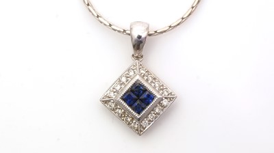 Lot 733 - A sapphire and diamond pendant