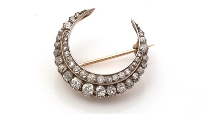 Lot 734 - A Victorian diamond crescent brooch